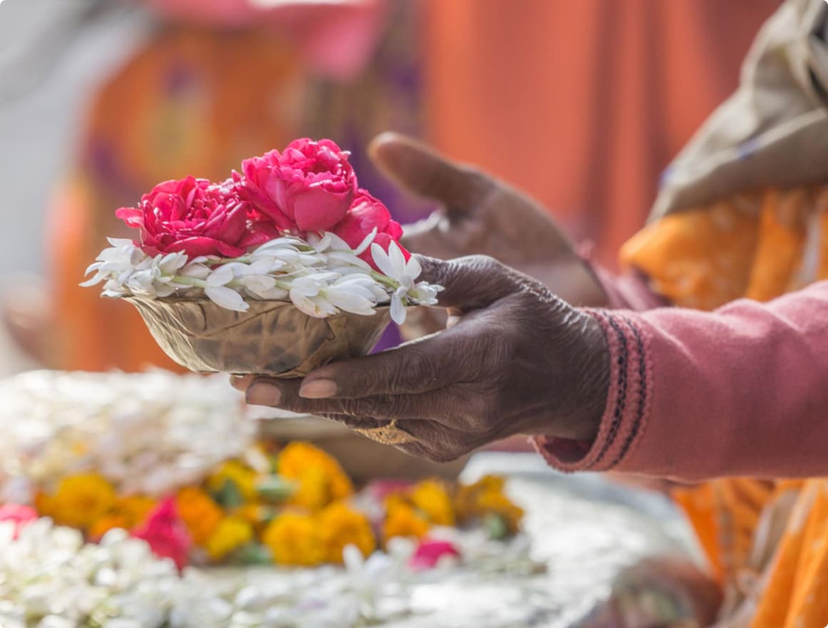 Family archana ritual with priest